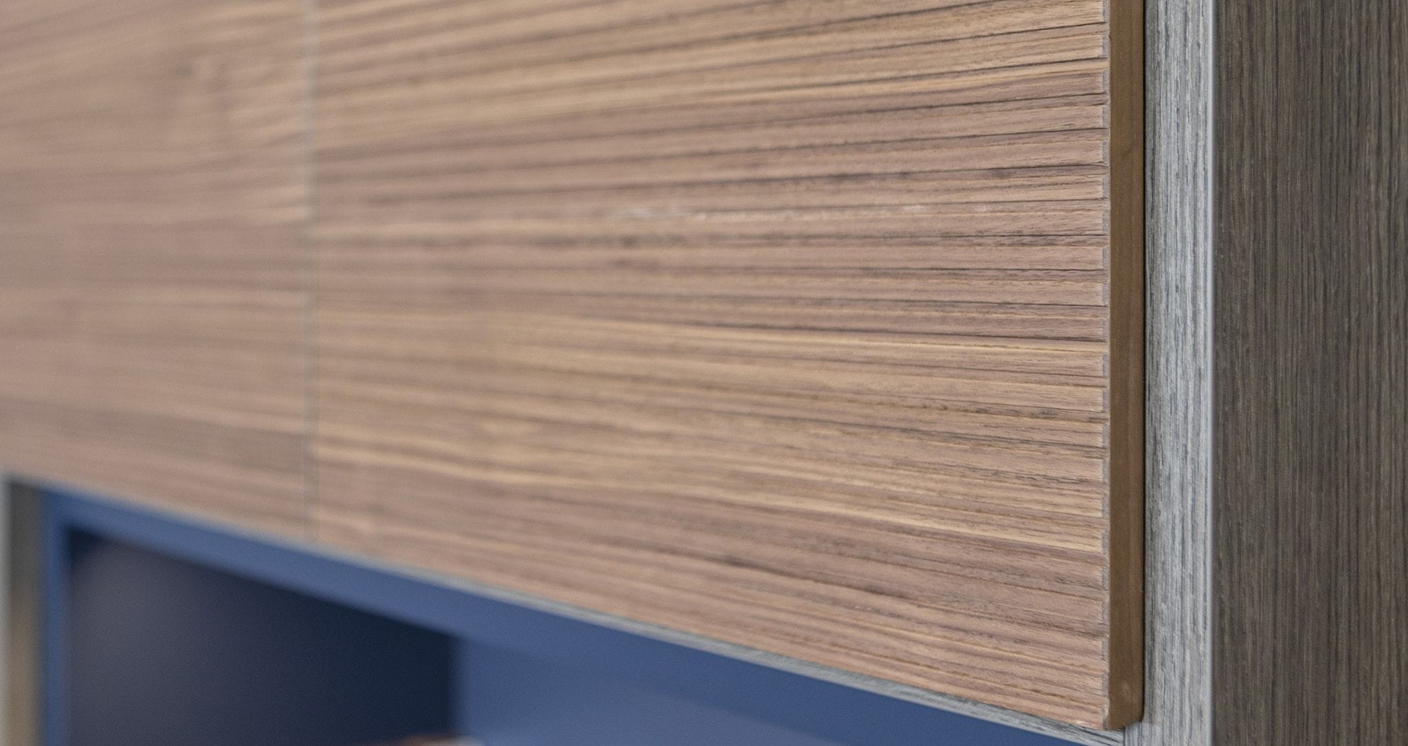 Custom textured media center cabinets by California Closets